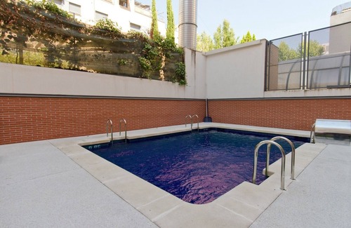 Adelfas Apartment | Inviting 2 Bedroom Apartment with Pool in Atocha