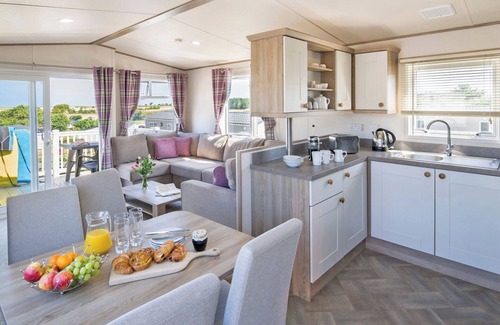 Holywell House | Comfortable 2-Bedroom Retreat at Holywell Bay with Ocean View