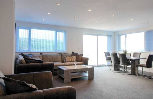 Holywell Cottage | Comfortable 2 Bedroom Stay with Oceanfront Views in Holywell Bay