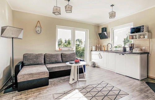Darlowo House | Idyllic Cottage Retreat in Gle with Spa & Lake Views