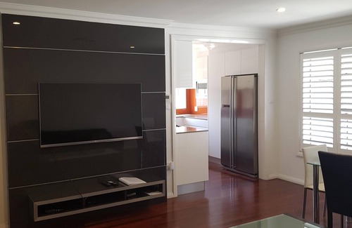 The Hill Apartment | Family-Friendly 2 Bedroom Apartment Steps from Beaches