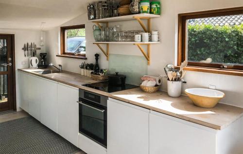 Ronde House | Oceanfront 2 Bedroom Home in Rønde with Child-Friendly Amenities