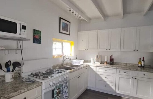 Creek House | Cozy 2 Bedroom Cottage Steps from the Sea with Hot Tub