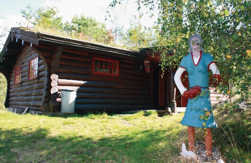 Amli House | Cozy Wilderness Cottage with Lake View and Spa Amenities