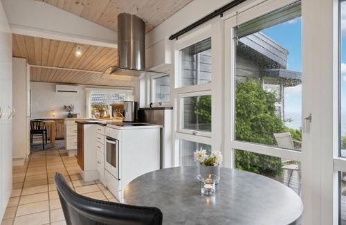 Nyborg House | Experience Breathtaking Views from Bovense Beach Home