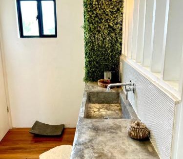 Ladyville House | 2 bedroom Guest House with comp ride to the airport