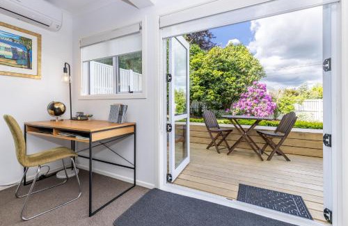Hamilton East Apartment | Cozy 2-Bedroom Retreat with Ocean View and Private Parking