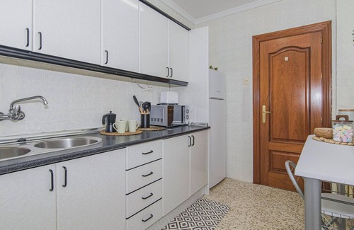 Chana Apartment | 2-Bedroom Retreat with Terrace in Granada - Steps from Metro and Bus