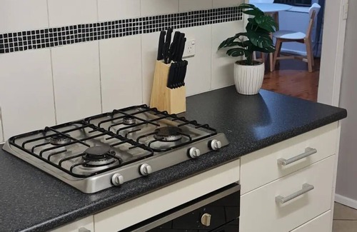 Oak Flats Apartment | Stylish 2 Bedroom Retreat with Entertainment Area