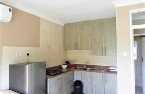 Harare Apartment | Cozy 2-Bedroom Apartment with En-Suite and Kitchenette