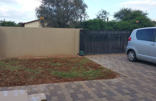 Gaborone House | Cozy 2-Bedroom Self-Catering House with Spa & Hot Tub