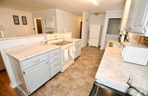 Wooded Estates House | Perfectly Located 4 Bedroom Home Near ND - Family Friendly