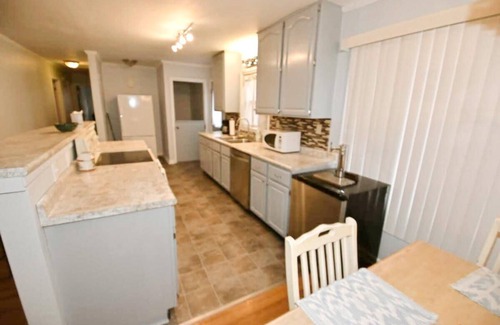 Wooded Estates House | Perfectly Located 4 Bedroom Home Near ND - Family Friendly
