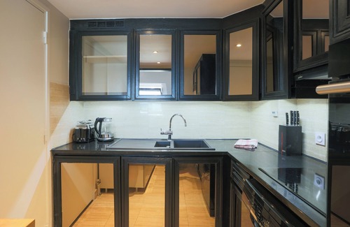 4th Arrondissement Apartment | Top Floor 2BR/2BA with Notre Dame & Eiffel Tower Views