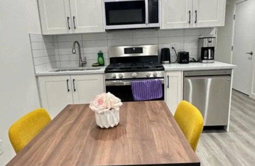 Northwest Calgary Apartment | Cozy 2 BR Walk-Out Basement with Lake View & EV Charging