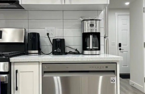 Northwest Calgary Apartment | Cozy 2 BR Walk-Out Basement with Lake View & EV Charging