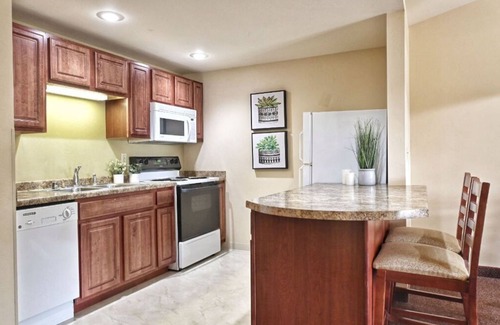 Pembine Apartment | Spacious 2 BR Suite for 8 with Hot Tub & Pool Access