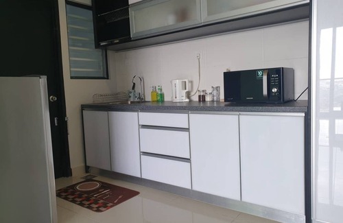 Bandar Kota Bharu Condo | Riverview Retreat: 2 BR Unit with Pool & Breakfast