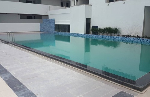 Bandar Kota Bharu Condo | Riverview Retreat: 2 BR Unit with Pool & Breakfast