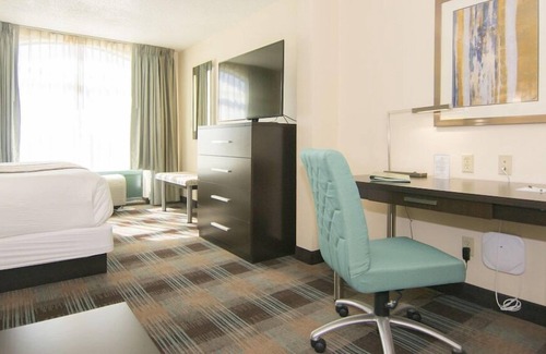 Airport North Hotel | Spacious 2 Connecting Suites with Pool & Family Amenities