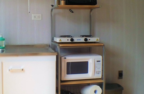 Guachipelin Apartment | Cozy Container Studio with Scenic Views and Key Amenities