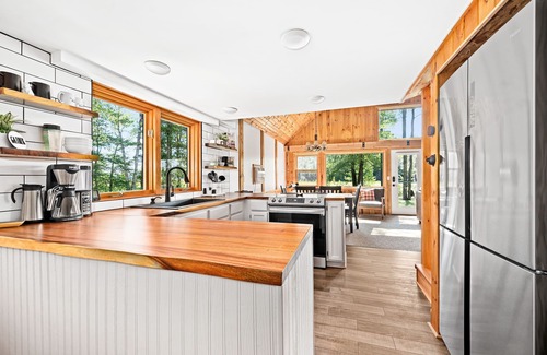 Hayward House | Cozy Waterfront Cabins with Epic Game Room & Ocean View