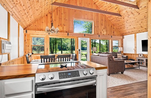 Hayward House | Cozy Waterfront Cabins with Epic Game Room & Ocean View