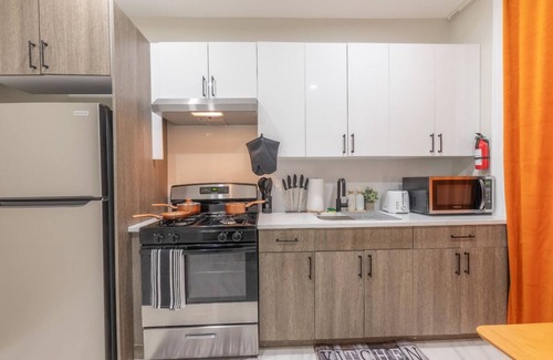 Ampere Apartment | Convenient Stay Near Airport with Free Street Parking