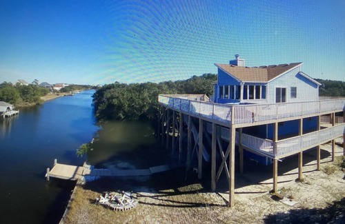 Carova Beach House | Pet-Friendly Waterfront Getaway with Hot Tub & Boat Dock