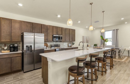 Trafalgar House | Inviting Home with Outdoor Kitchen & Waterfall Pool Experience