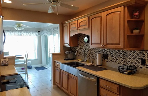 Port Charlotte House | Family-Friendly King Suites with Waterfront Views and Pool