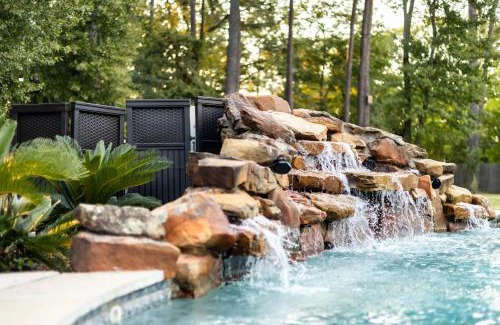 Tomball House | Indulge in King Suites with Private Pool and Spa Retreat