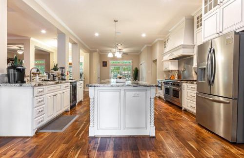 Tomball House | Indulge in King Suites with Private Pool and Spa Retreat