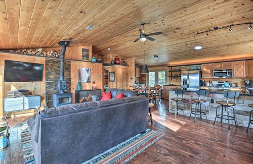 Saint Mary's Cabin | Relaxing St. Mary's Retreat: Hot Tub, Sauna & Mountain Views