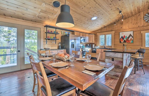 Saint Mary's Cabin | Relaxing St. Mary's Retreat: Hot Tub, Sauna & Mountain Views
