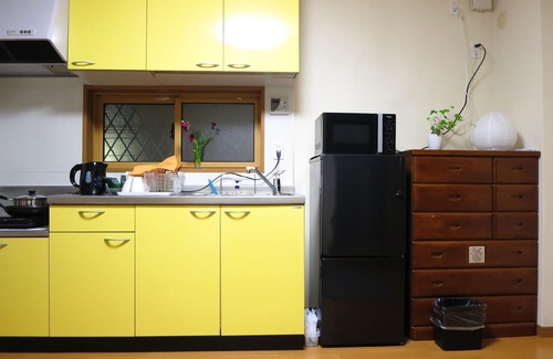 Ota House | Quiet Retreat: Steps from Asakusa Line with Family Amenities