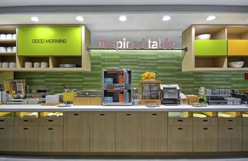 Alpine Center Hotel | Relaxing Getaway Near John Ball Park Zoo with Free Breakfast