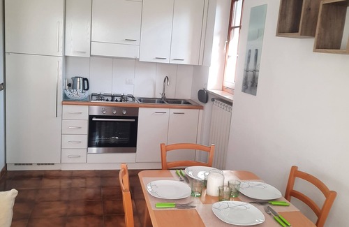 Cannobio Apartment | Sunny 2-Room Apartment Steps from the Beach with Lake View