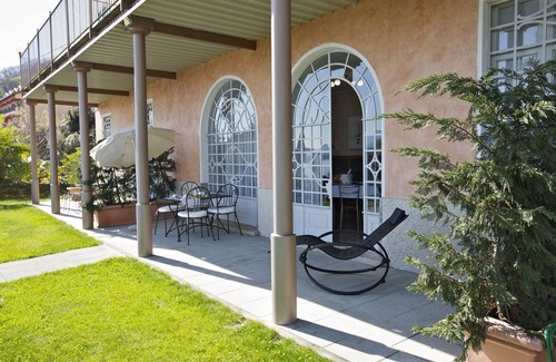 Carciano Apartment | 2-room apartment with terrace and garden in an Art Nouveau villa with communal pool