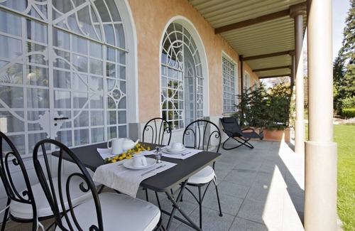 Carciano Apartment | 2-room apartment with terrace and garden in an Art Nouveau villa with communal pool