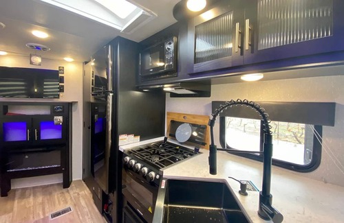 Medford House | Cozy RV Retreats with Full Kitchen & Dining Area