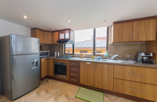 Cuenca Condo | Exceptional Metropolitan City View Condo with Spa & Breakfast