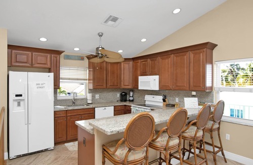 Coury House | Impressive 7-Bedroom Home with Private Pool & Dockage