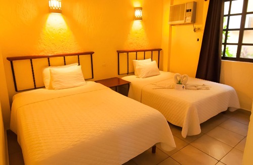 Downtown Cancun Hotel | 2 Units | Family Stay in Cancún | Pool & Gardens Near Puerto Juárez Beach