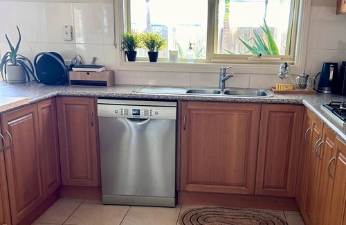 Torquay House | Beach Retreat in Torquay: Relaxation with Sauna & Golf