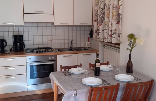Cannobio Apartment | Cozy 2-Room Apartment Steps from the Beach with Spa & Views