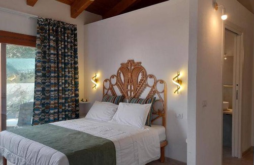 Riola Sardo Bed & Breakfast | Cozy Bed and Breakfast for Two with Pet-Friendly Charm