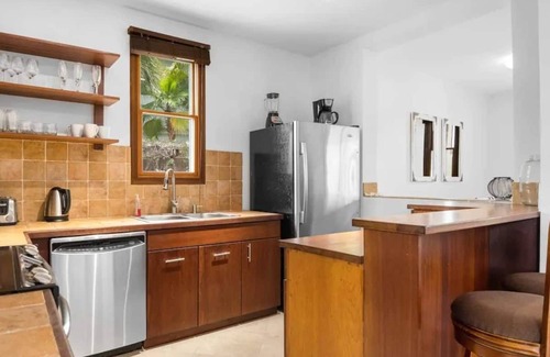Leeward Settlement House | Exclusive 10% Off: Poolside Oasis Near Grace Bay