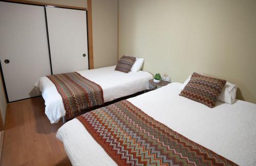 Sakura Apartment | Exclusive 201号室貸切 for Family-Friendly Getaways