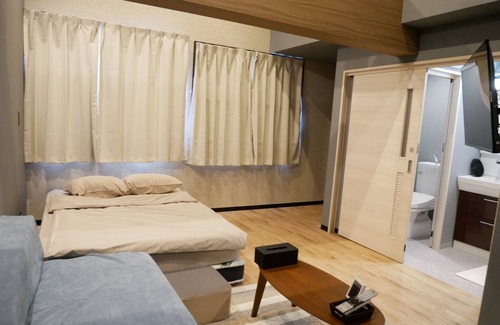 Amami Hotel | Discover HOOD Inn: Private Sauna & Family-Friendly Comfort